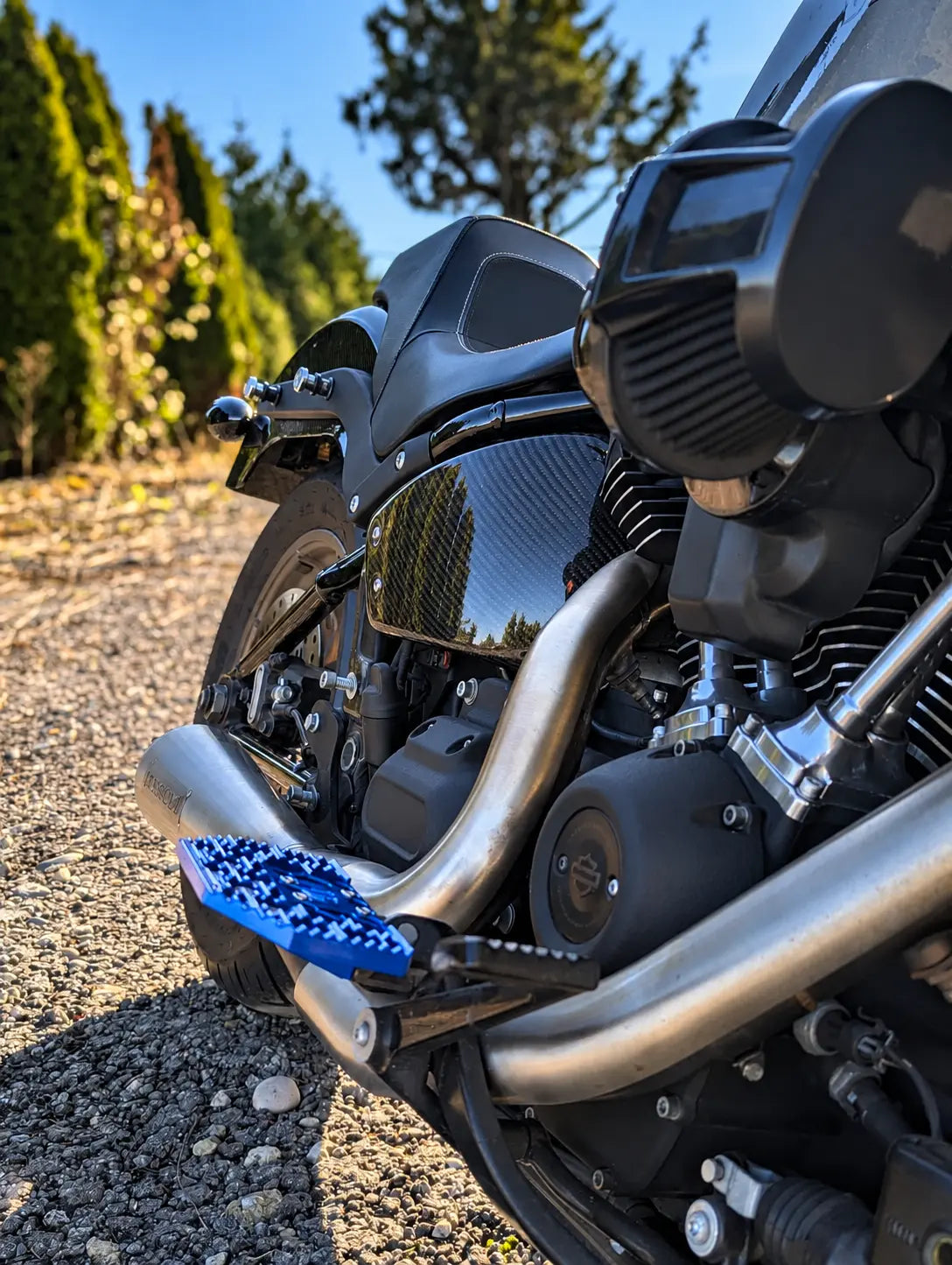 Carbon detailing beneath the seat of a Low Rider motorcycle